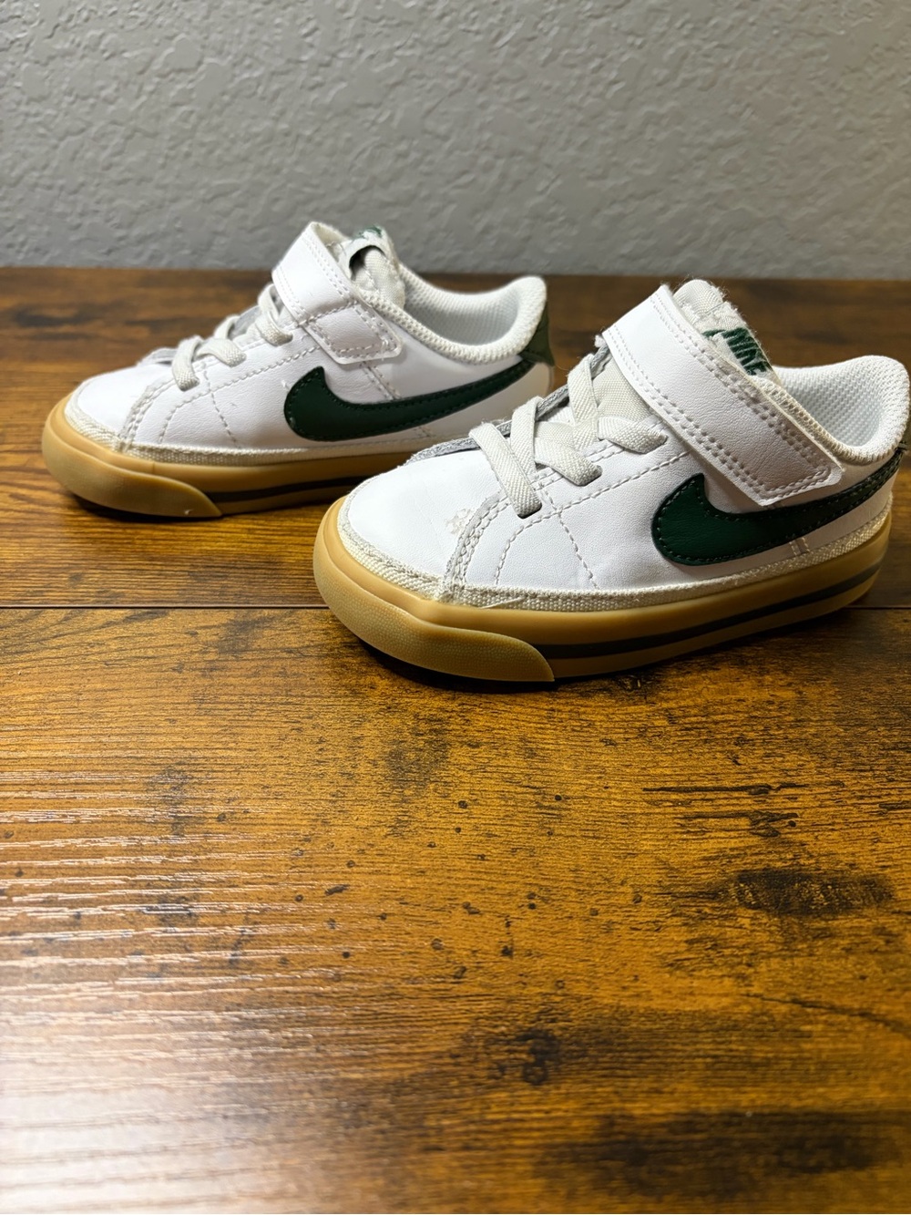 Nike Kids White Sneakers with Green Swoosh and Gum Outsole